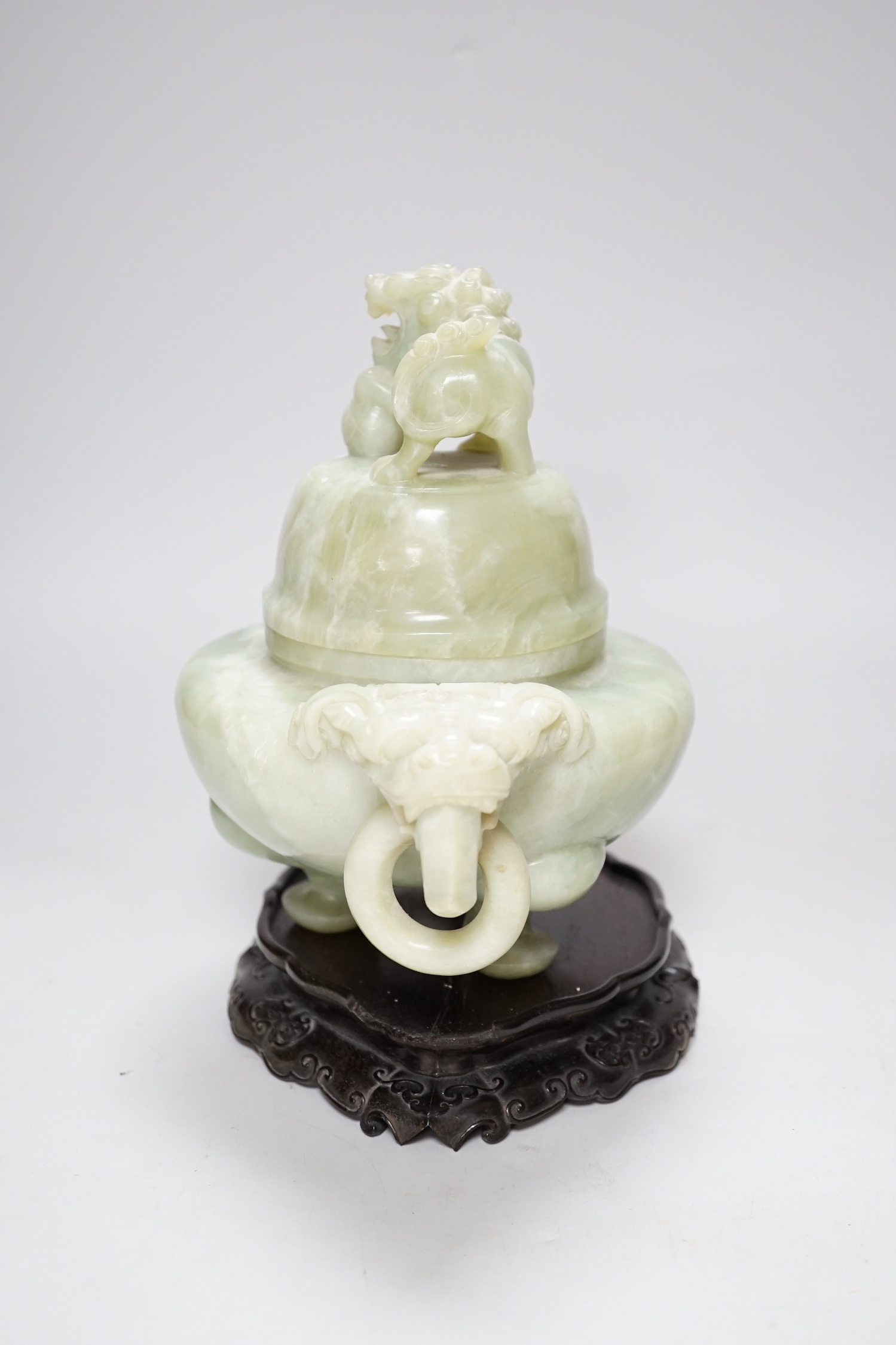 A large Chinese bowenite jade censer and cover on carved hardwood stand, 21cm wide